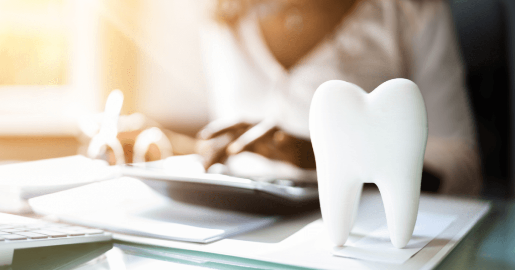 Ceramic tooth model on a desk